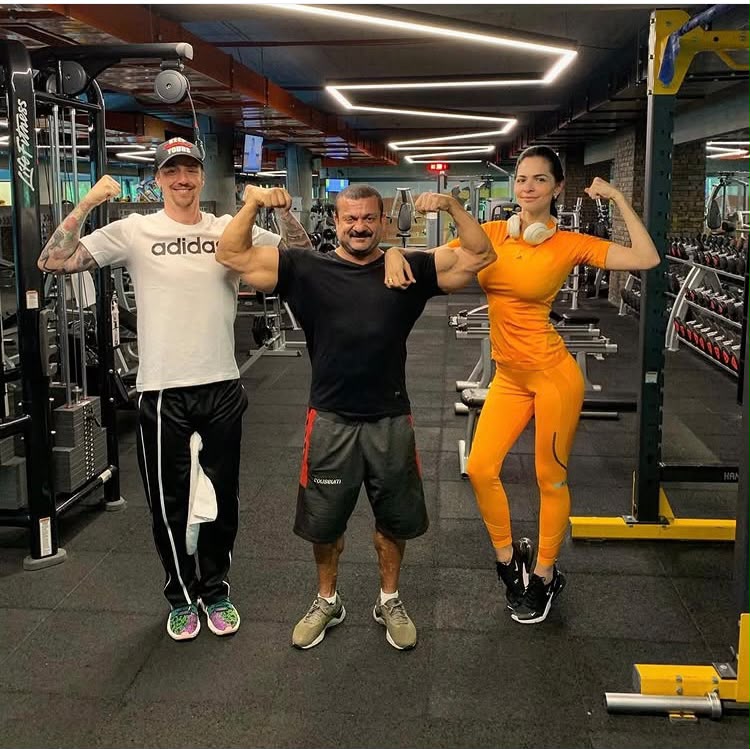 With a client, gym track